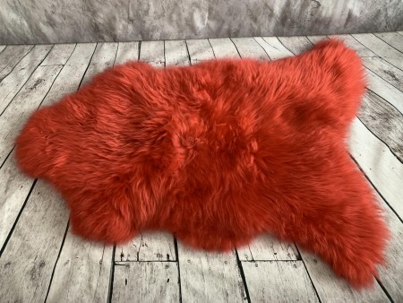 Ekte Svenske saueskinn / lammeskinn i Coral farge